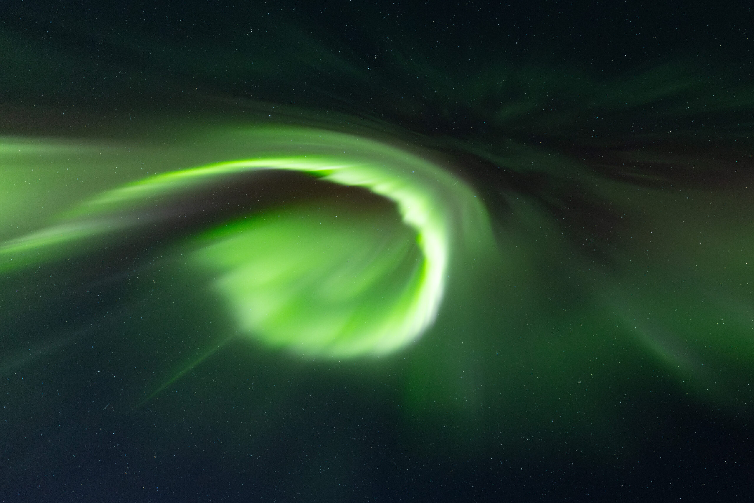 Northern Lights - Fairbanks, Alaska Green swirl of northern lights overhead.